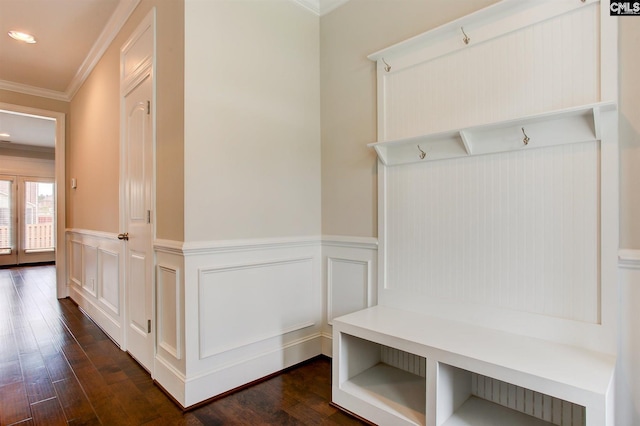 mudroom with dark hardwood / wood-style flooring and ornamental molding