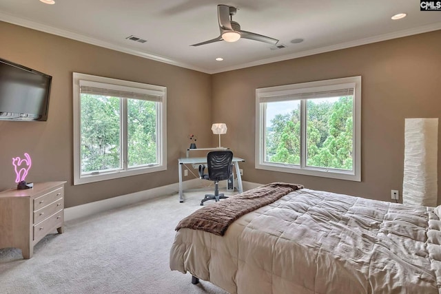 bedroom featuring ceiling fan, ornamental molding, and light carpet