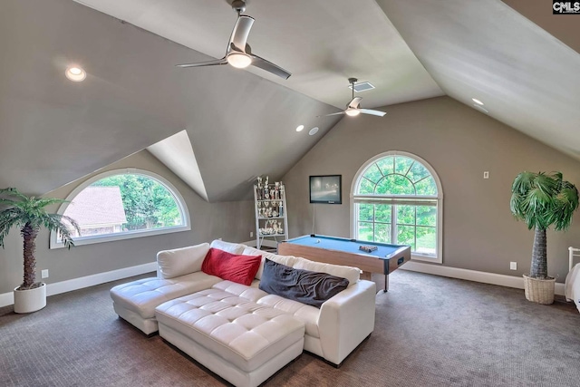 interior space with lofted ceiling, pool table, ceiling fan, and dark colored carpet