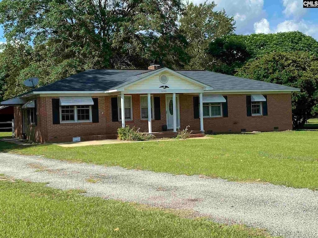 single story home featuring a front yard