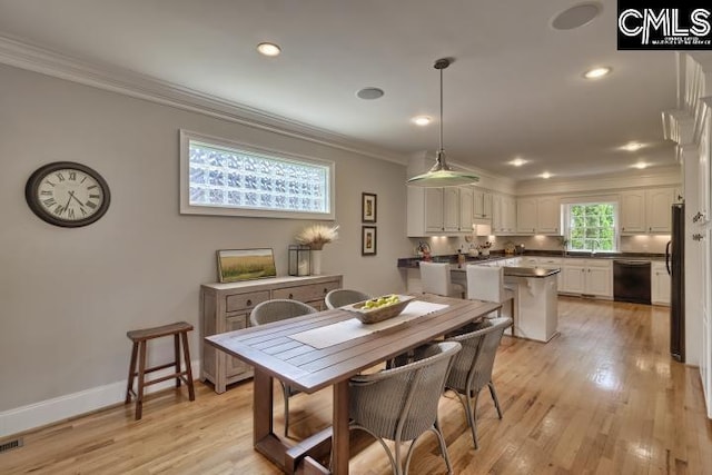 12 Club Ridge Ct, Elgin, SC 29045 - dining area featuring ornamental molding, sink, and light hardwood / wood-style flooring