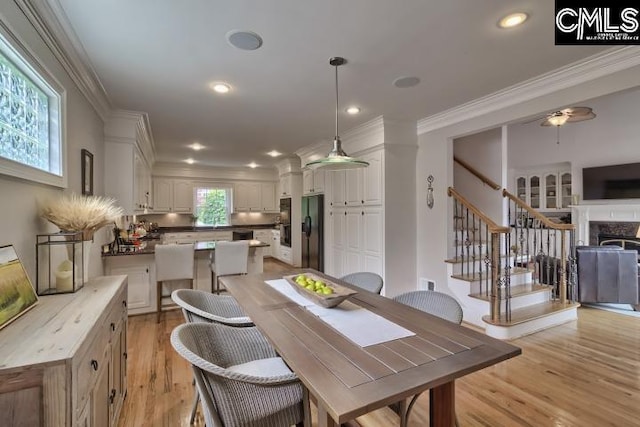 12 Club Ridge Ct, Elgin, SC 29045 - dining room featuring crown molding, ceiling fan, and light hardwood / wood-style flooring