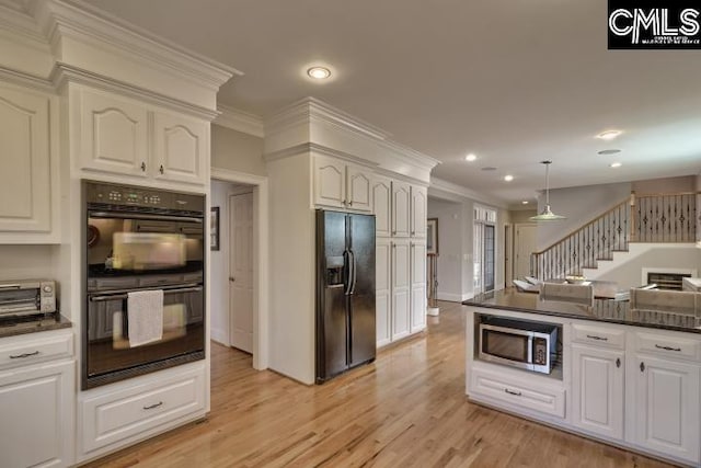 12 Club Ridge Ct, Elgin, SC 29045 - kitchen featuring white cabinets, pendant lighting, light hardwood / wood-style floors, and black appliances
