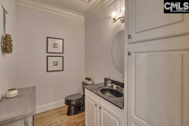 12 Club Ridge Ct, Elgin, SC 29045 - bathroom featuring toilet, ornamental molding, vanity, and hardwood / wood-style floors