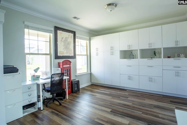 office with dark hardwood / wood-style flooring, ornamental molding, and a wealth of natural light