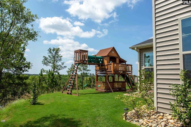 view of jungle gym with a lawn