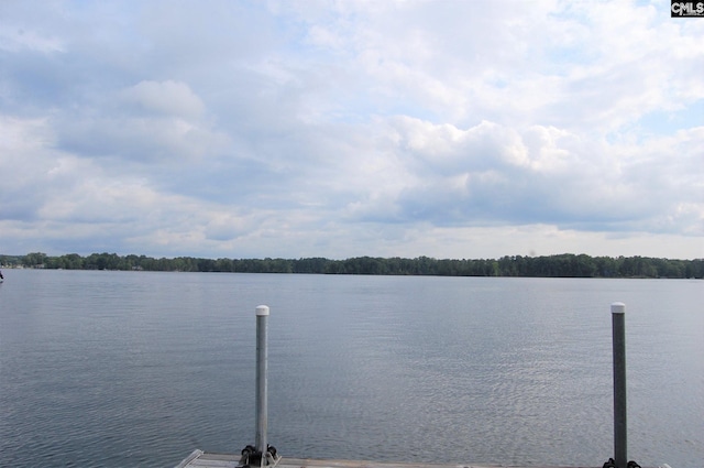 exterior space with a water view