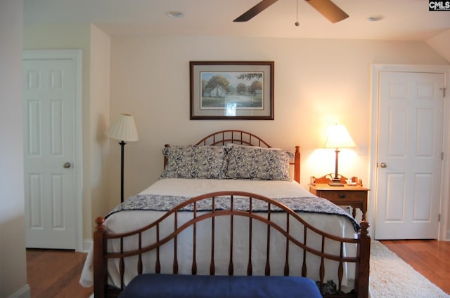 bedroom featuring ceiling fan and hardwood / wood-style flooring