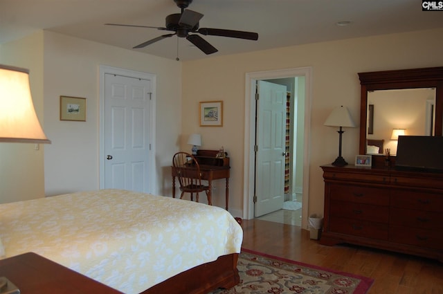 bedroom featuring light hardwood / wood-style flooring and ceiling fan