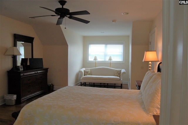 bedroom featuring ceiling fan and vaulted ceiling