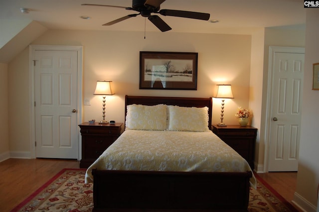 bedroom featuring ceiling fan and hardwood / wood-style floors