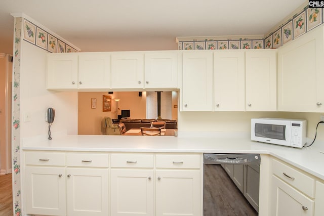 kitchen with black dishwasher, white cabinets, and dark hardwood / wood-style floors