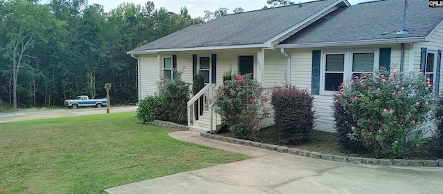 view of front of home with a front yard