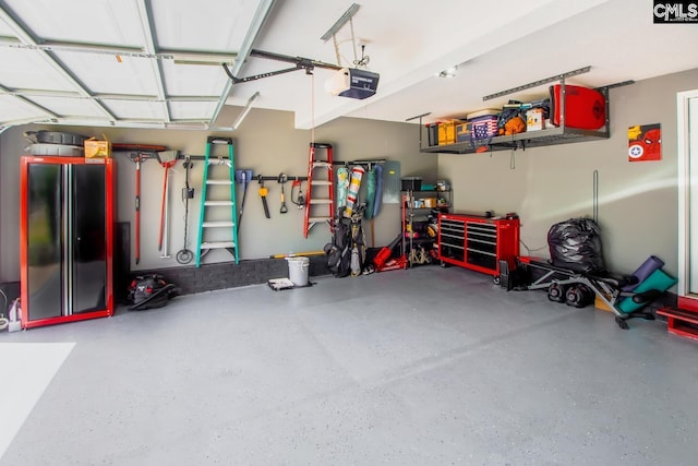 garage featuring a garage door opener