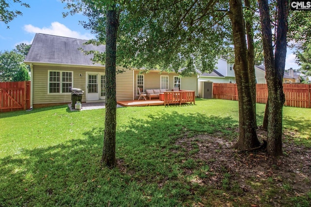 view of yard featuring a wooden deck