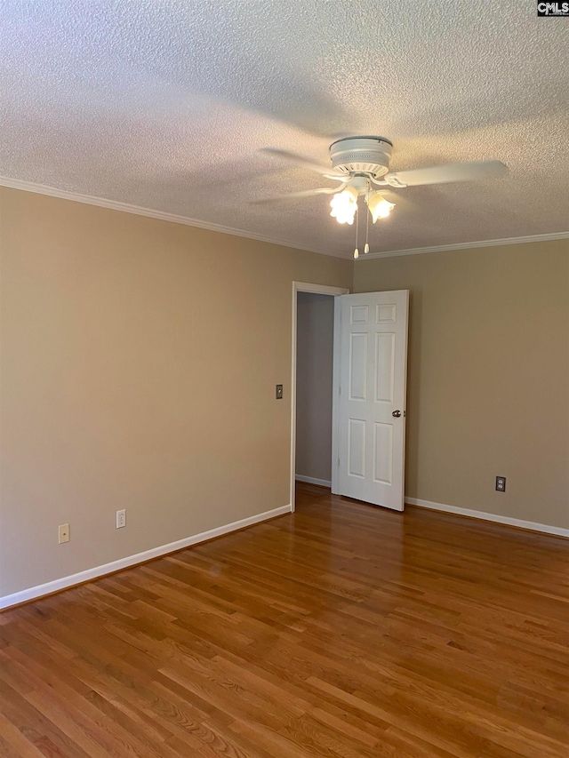 unfurnished room with crown molding, a textured ceiling, ceiling fan, and hardwood / wood-style flooring