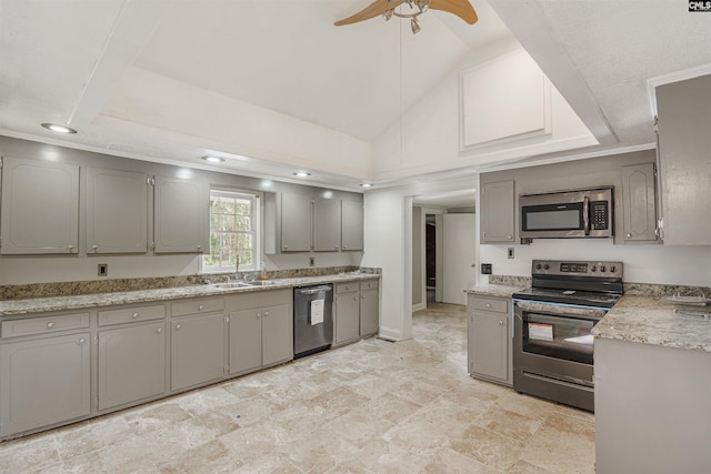 kitchen with light tile floors, gray cabinets, ceiling fan, and stainless steel appliances