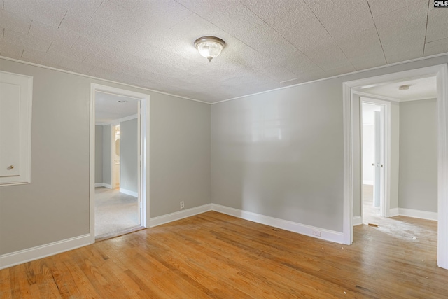 unfurnished room featuring light hardwood / wood-style flooring