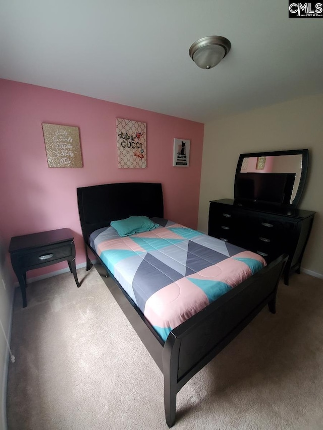 bedroom featuring carpet flooring