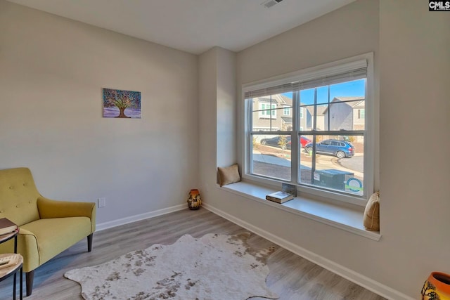 living area featuring light wood-type flooring