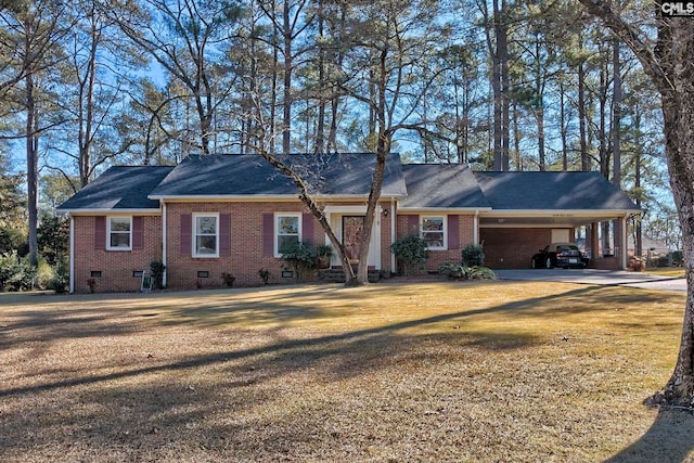 ranch-style house with a carport and a front lawn