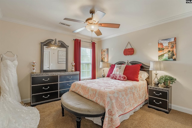 carpeted bedroom with ornamental molding and ceiling fan