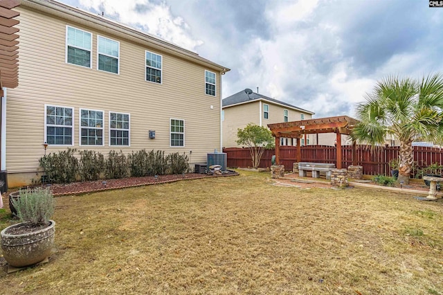 exterior space featuring central AC unit and a pergola