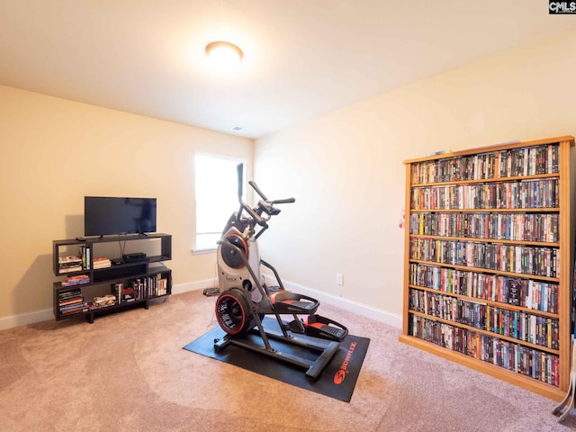 workout room with light carpet