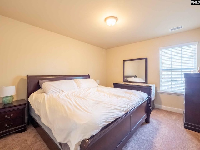 bedroom featuring carpet