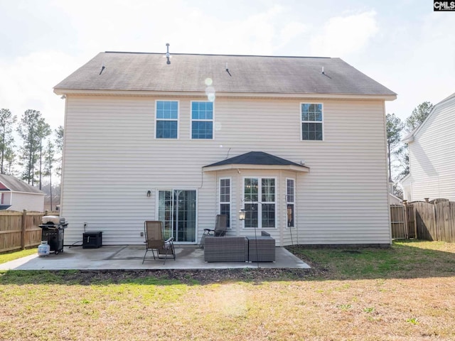 back of property with a lawn, an outdoor hangout area, central AC, and a patio