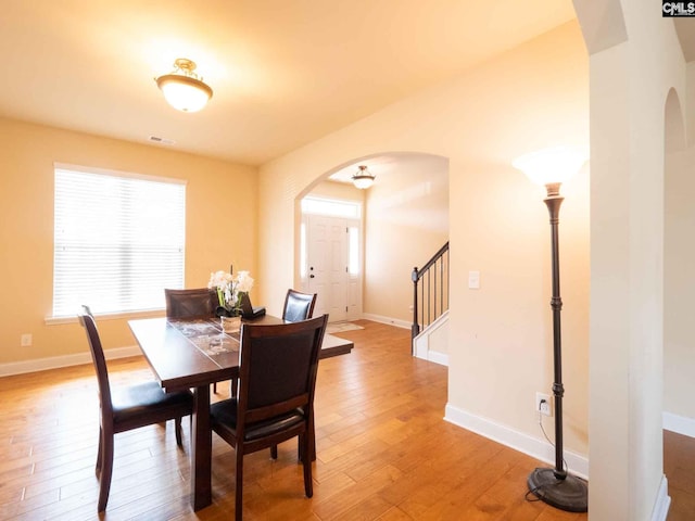 dining room featuring light hardwood / wood-style flooring