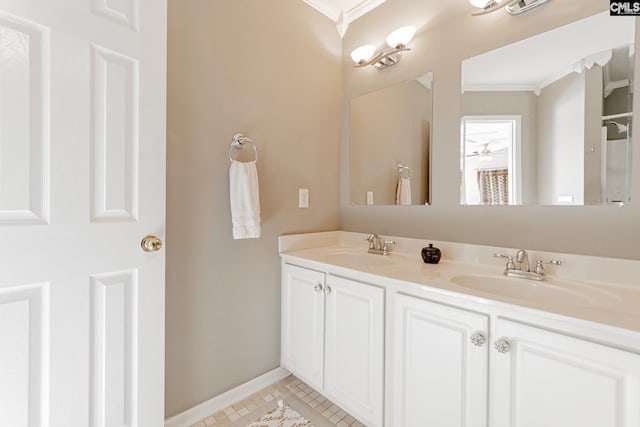 bathroom with crown molding, tile floors, and dual bowl vanity