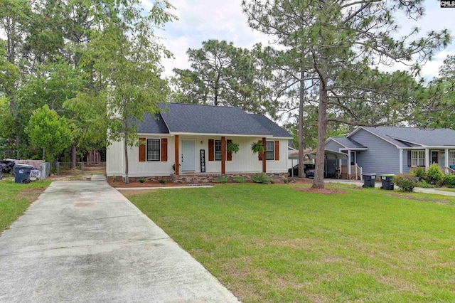 single story home with a front yard and covered porch