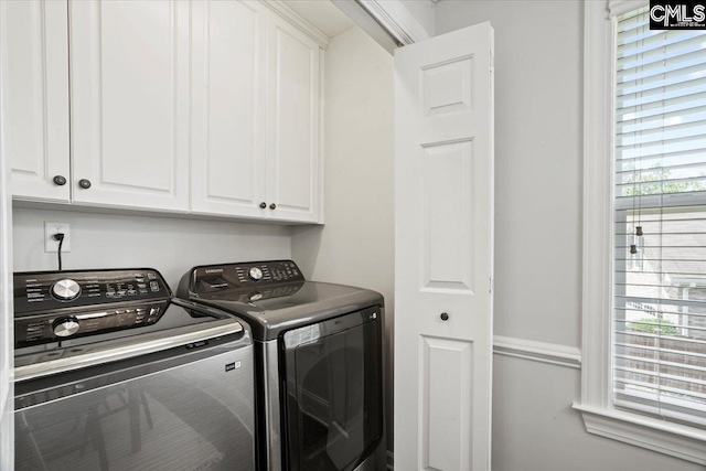 51 Swallowtail Ct, Columbia, SC 29229 - clothes washing area with cabinets and washing machine and clothes dryer
