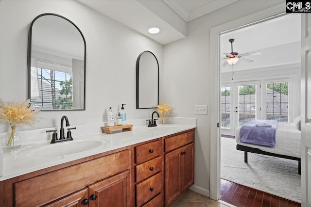 51 Swallowtail Ct, Columbia, SC 29229 - bathroom featuring ceiling fan, ornamental molding, hardwood / wood-style flooring, and double vanity