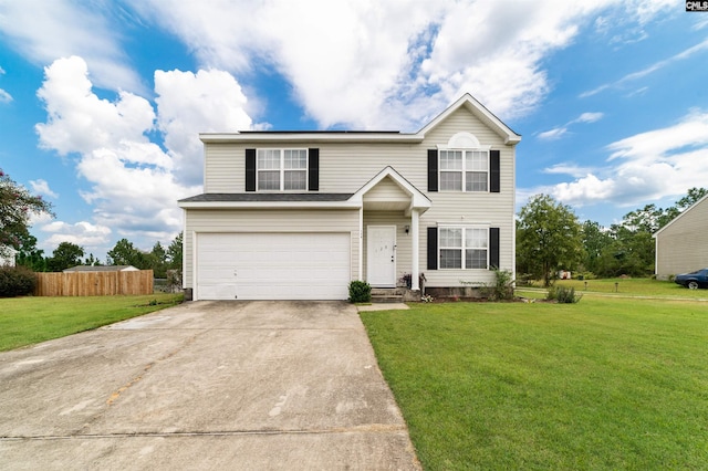 view of front of property with a front lawn and a garage