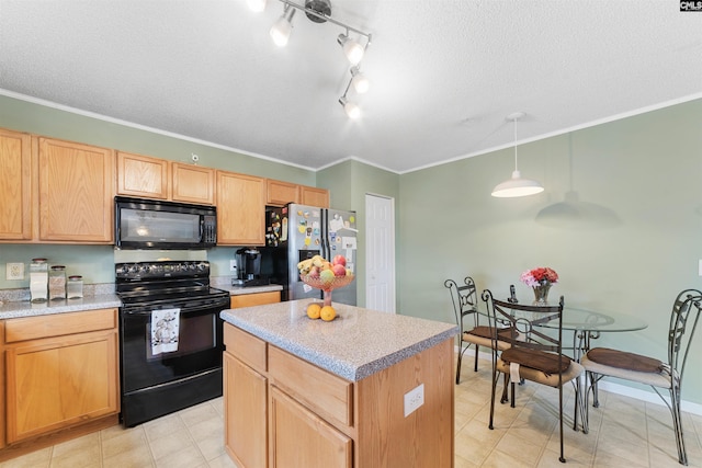 kitchen featuring rail lighting, ornamental molding, decorative light fixtures, and black appliances