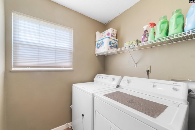 washroom with separate washer and dryer