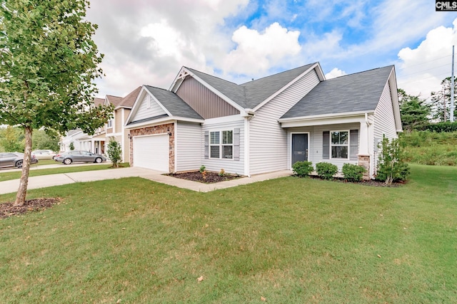 view of front of house featuring a front yard and a garage