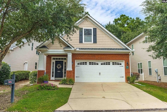 craftsman house featuring a garage