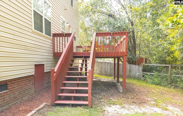 view of playground featuring a deck