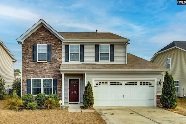 view of front of property featuring a garage