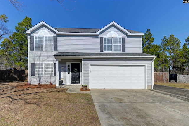 view of front of home with a garage