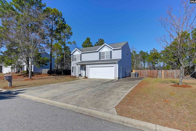 view of front of property with a front lawn and a garage