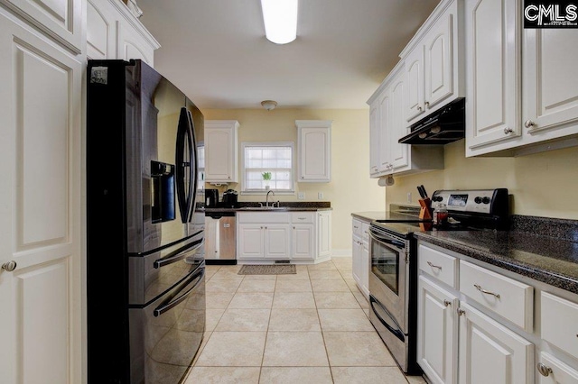 kitchen with appliances with stainless steel finishes, white cabinets, and sink