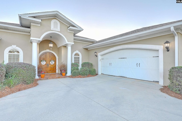 view of front of property featuring a garage