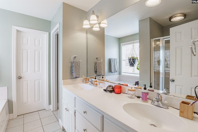 bathroom featuring double sink vanity, tile flooring, and separate shower and tub