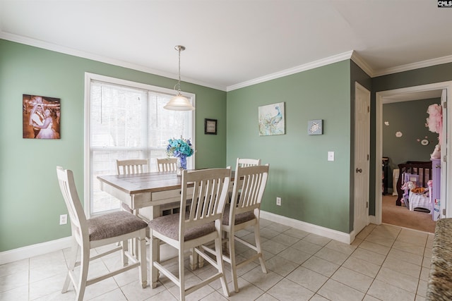 tiled dining room with ornamental molding