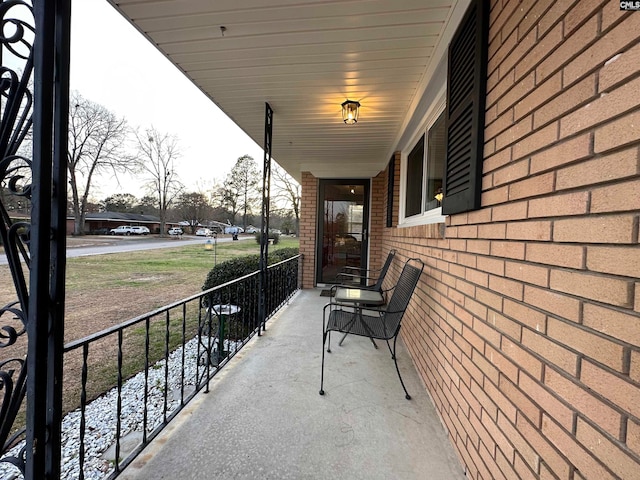 view of patio / terrace with a balcony