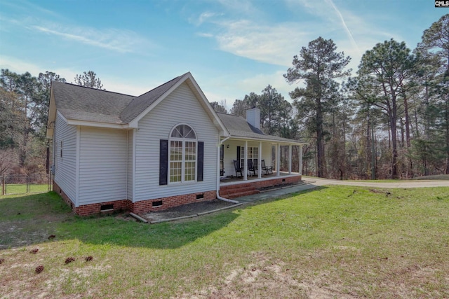 view of front of property with a porch and a front yard